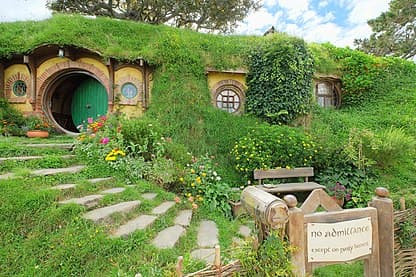 Step into the real-life set of The Lord of the Rings in Hobbiton, where lush green hills and charming hobbit holes bring the fantasy world to life. Later, be mesmerized by the Waitomo Glowworm Caves, where thousands of twinkling glowworms create a magical underground spectacle.