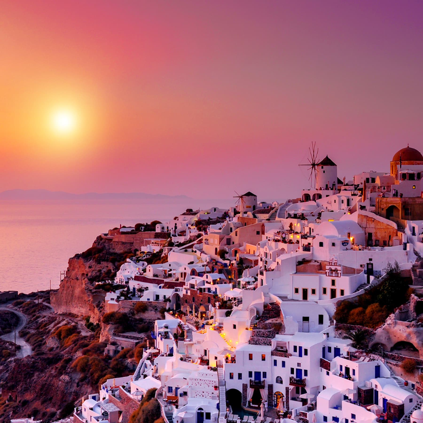 Experience the iconic sunsets of Santorini from Oia, where the sky and sea meet in a spectacular display of colors, providing a perfect backdrop for unforgettable memories.