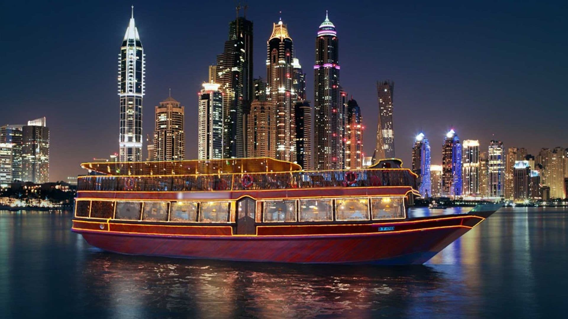 Dhow Cruise on Dubai Creek: Romantic evening cruise with views of iconic Dubai landmarks, buffet dinner, and live entertainment.