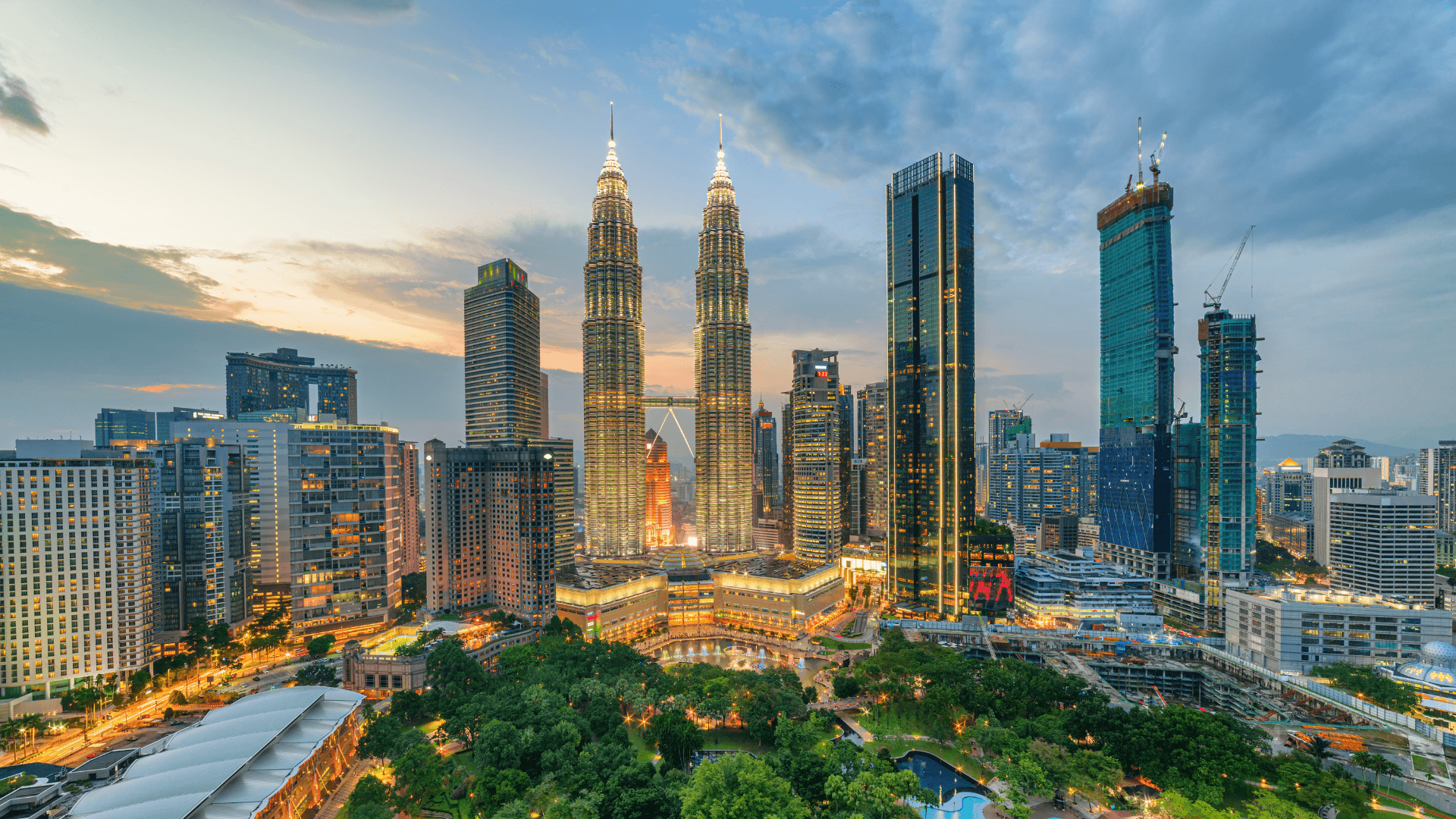 "Petronas Twin Towers & Batu Caves – Iconic city views meet vibrant cultural wonders in Kuala Lumpur."