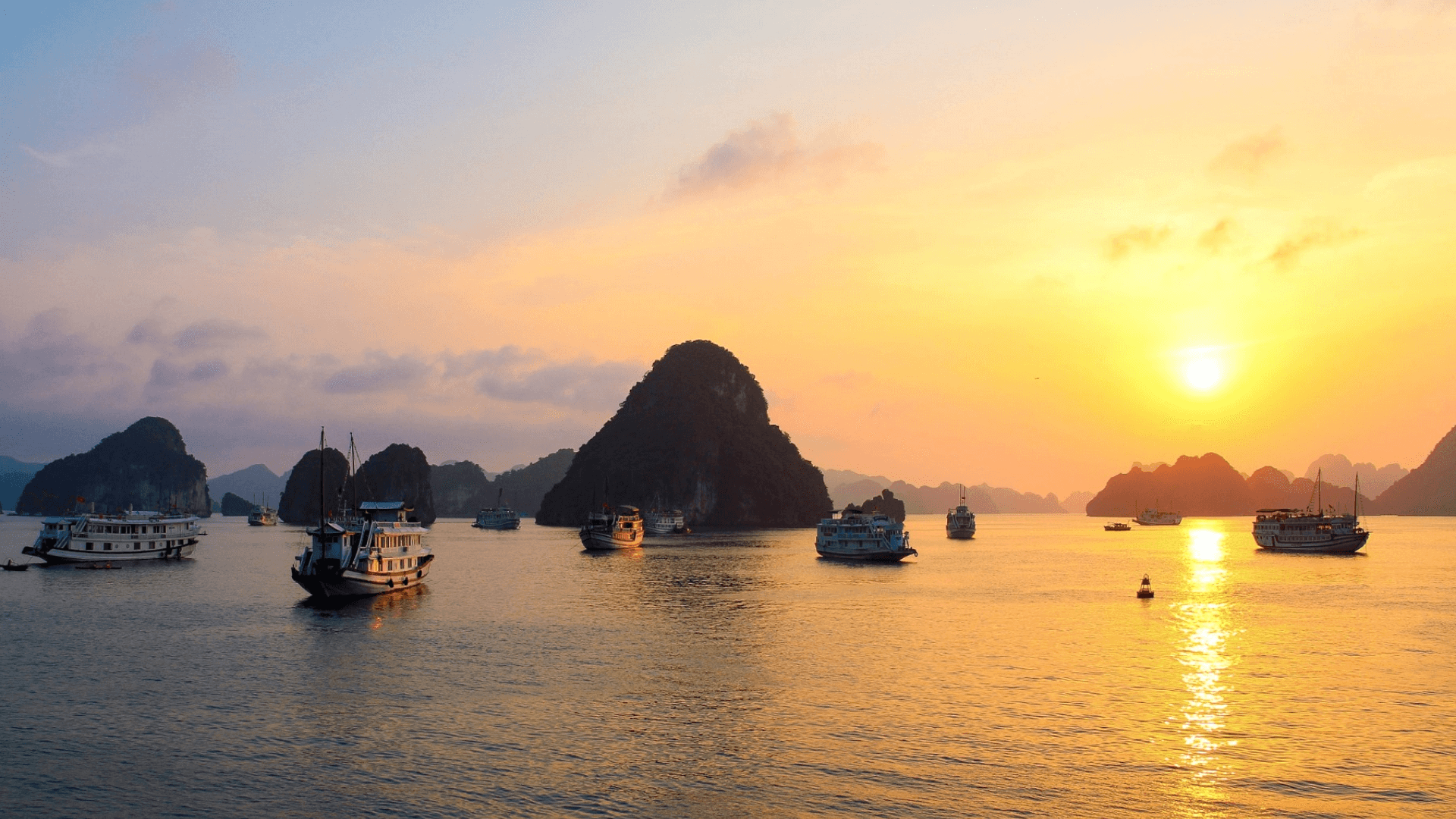 Experience the breathtaking scenery of Halong Bay on a luxurious overnight cruise, complete with kayaking adventures and sunset celebrations on the sundeck.