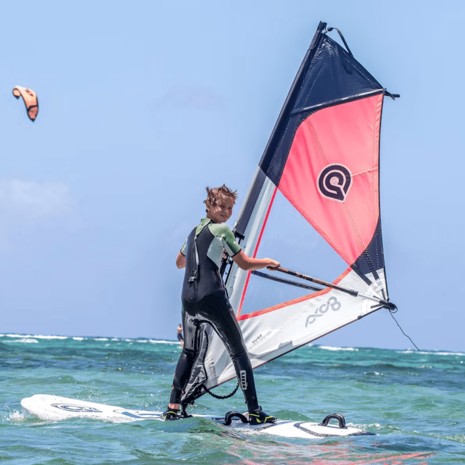 Water sports including snorkeling, paddleboarding, and kayaking.